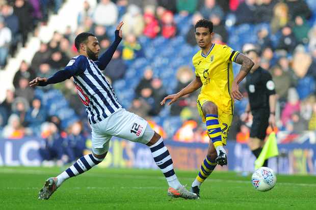 BIRMINGHAM, ENGLAND - DECEMBER 08: Kyle Naughton of Swansea City in action with Matheus Pereira of West Brom during the Sky Bet Championship match between West Bromwich Albion and Swansea City at The Hawthorns on December 08, 2019 in Cardiff, Wales. (Photo by Athena Pictures/Getty Images)